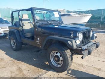  Salvage Jeep Wrangler